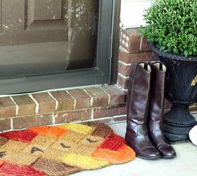 s 17 inviting fall front porch ideas, Leave your boots at the door and come on in