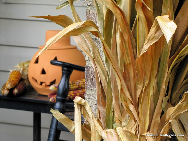 s 17 inviting fall front porch ideas, Pumpkins and corn stalks and gourds oh my