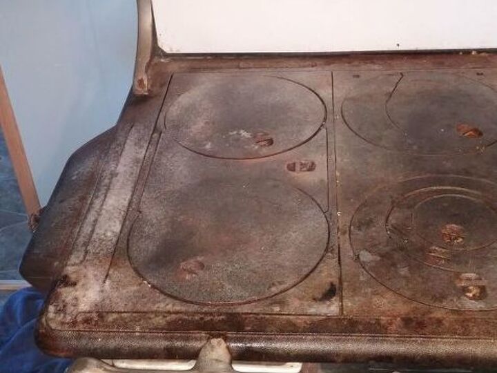 q how to clean an old wood burning stove in our cabin