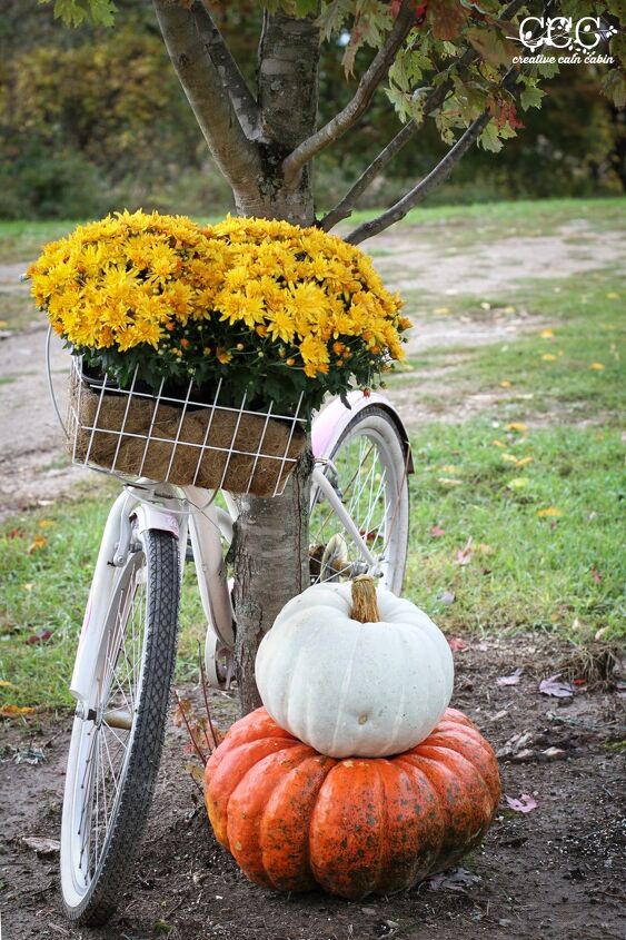 s 18 diy fall decor ideas we re falling for hard, Plant your bike in the yard for this one