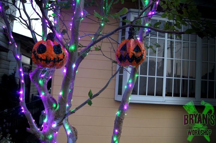 dollar store pumpkin buckets all up in your tree