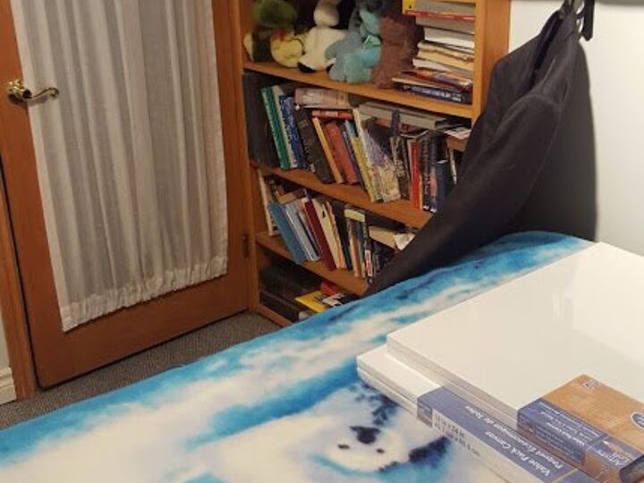 q how can i make this small guest bedroom work for my art room