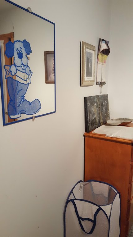 q how can i make this small guest bedroom work for my art room