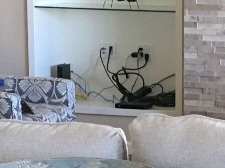 q how do i hide the cords cable tv internet in my built in shelving