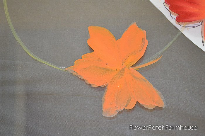 paint leaves on an old window for a unique wreath