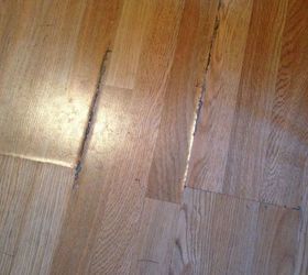 How do I camouflage water damaged laminate flooring?
