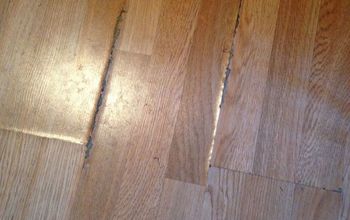 How do I camouflage water damaged laminate flooring?