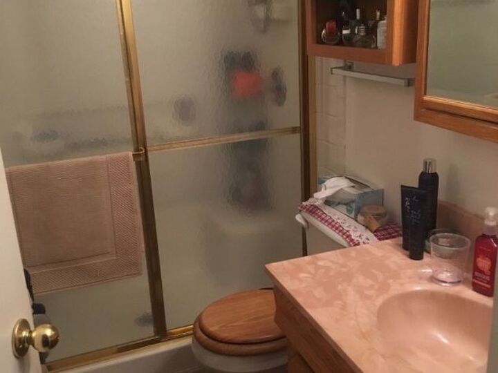 q how do i make my tiny bathroom look bigger