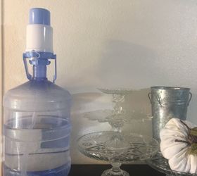 how do i hide an ugly 5 gallon water jug with a top pump