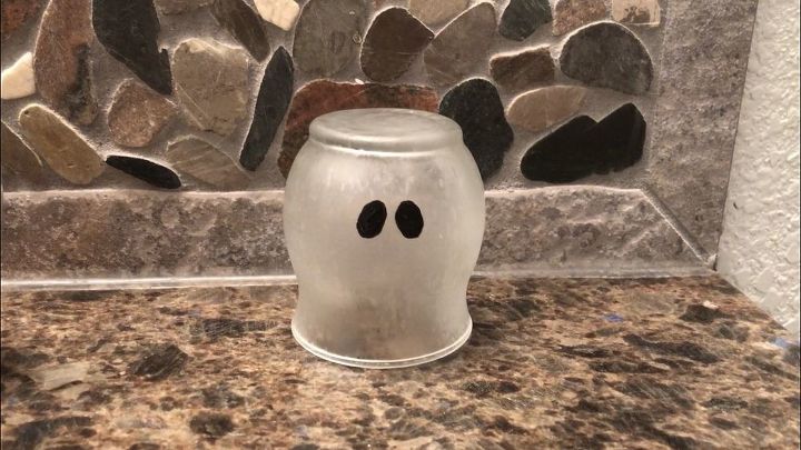 candle holder to etched ghost