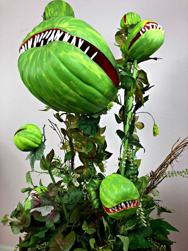 s 17 halloween decorations that ll make your neighbors giggle, Make a Man Eating Plant for Halloween