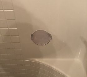 how to remove a plastic shower mount from the wall