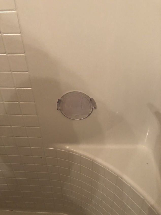 how to remove a plastic shower mount from the wall