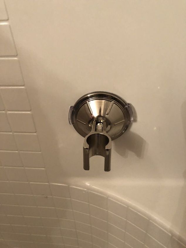 how to remove a plastic shower mount from the wall