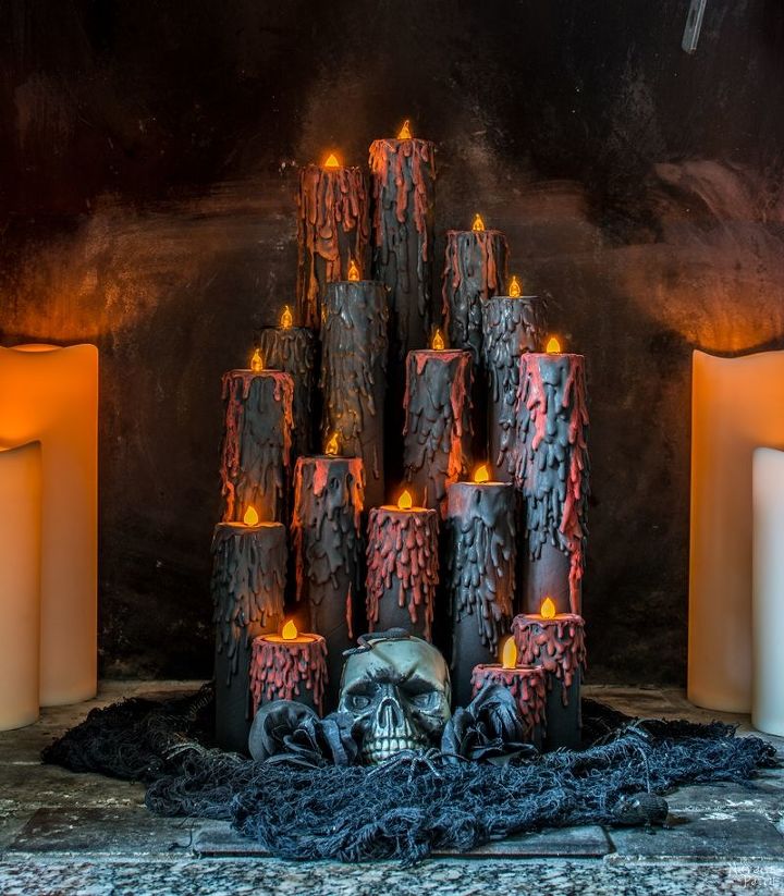 s 17 halloween decorations that ll make your neighbors giggle, Blood candles that ll make your guests scream
