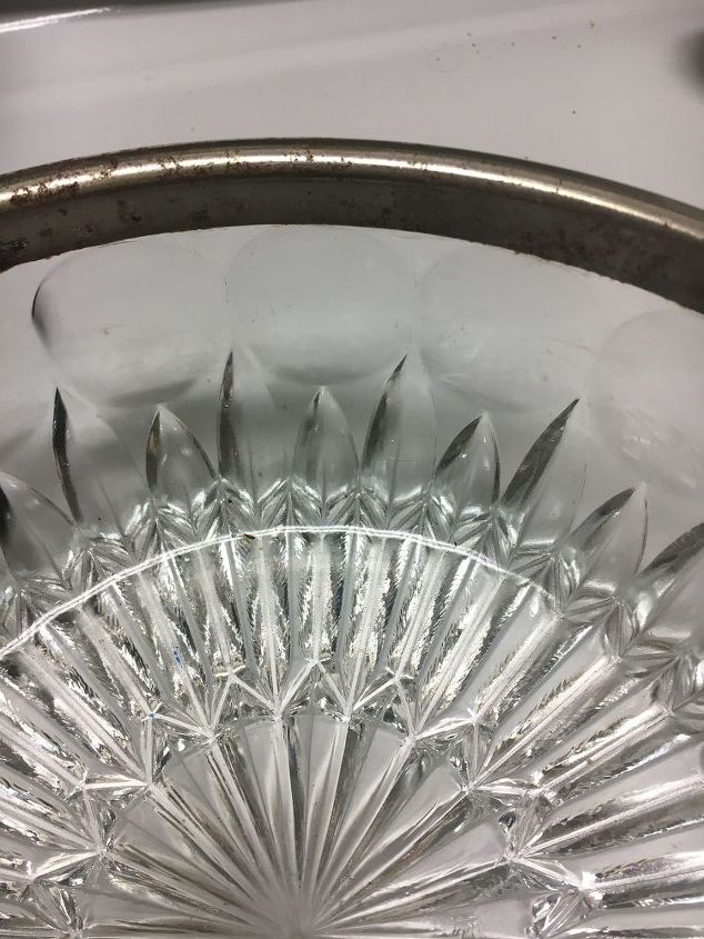 q how to remove rust on a silver plated rim on a cut glass bowl