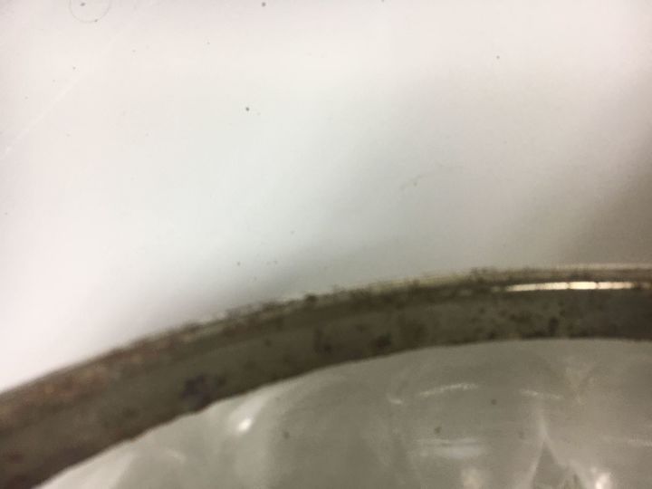 q how to remove rust on a silver plated rim on a cut glass bowl