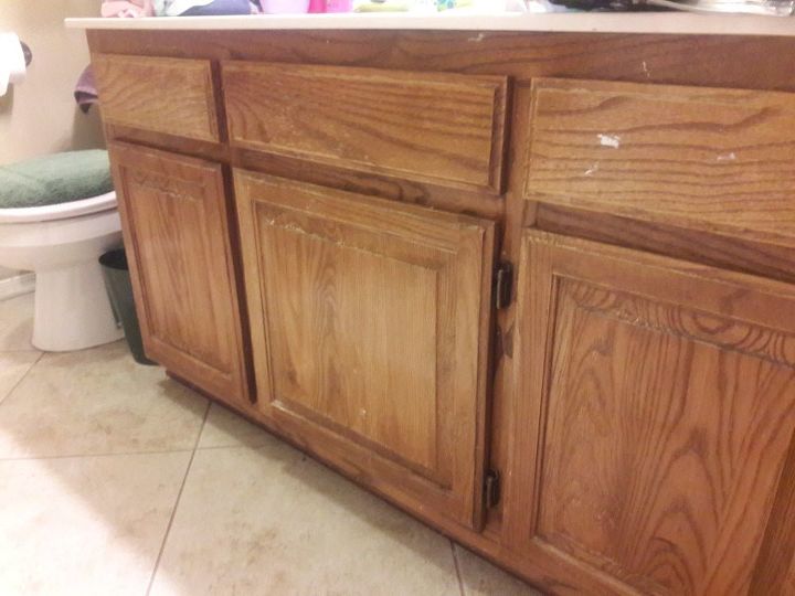 q how can i update or clean up these old bathroom cabinets