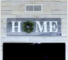 rustic wood home sign with a eucalyptus wreath