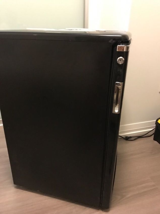 how to fix a wine fridge door that is not closing properly