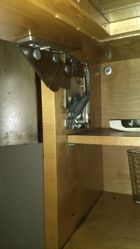 q kitchen cabinet locked in open position how to fix