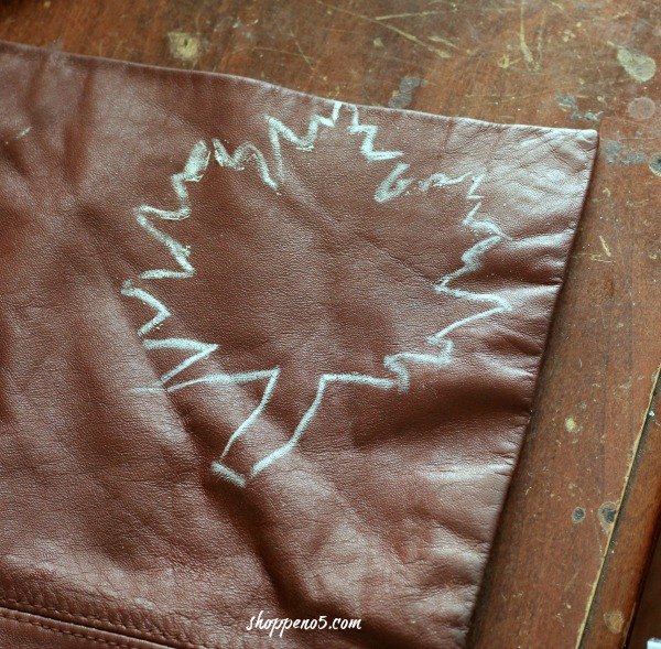 a leaf garland made from a leather jacket
