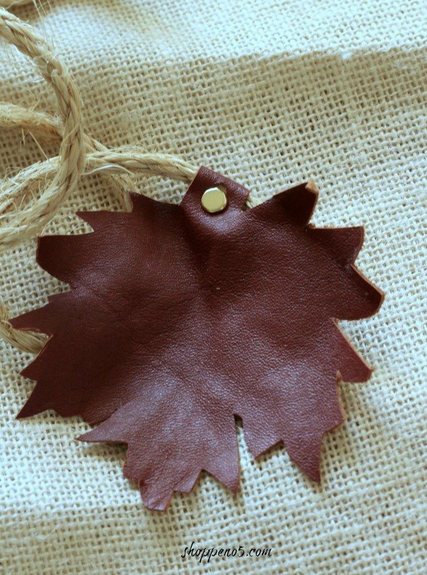 a leaf garland made from a leather jacket