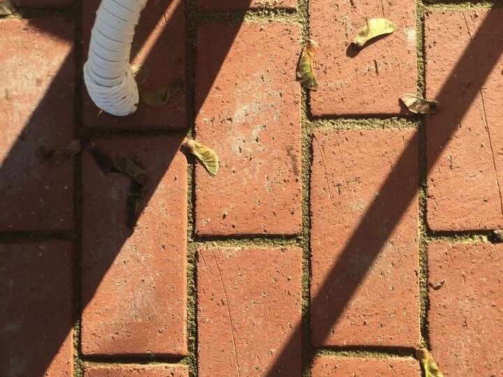 q how do i remove polymeric sandthat dried on our brick pavers