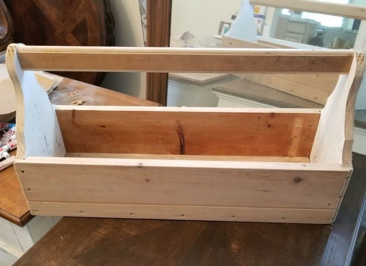 add trendy bathroom shelving using an old wooden toolbox