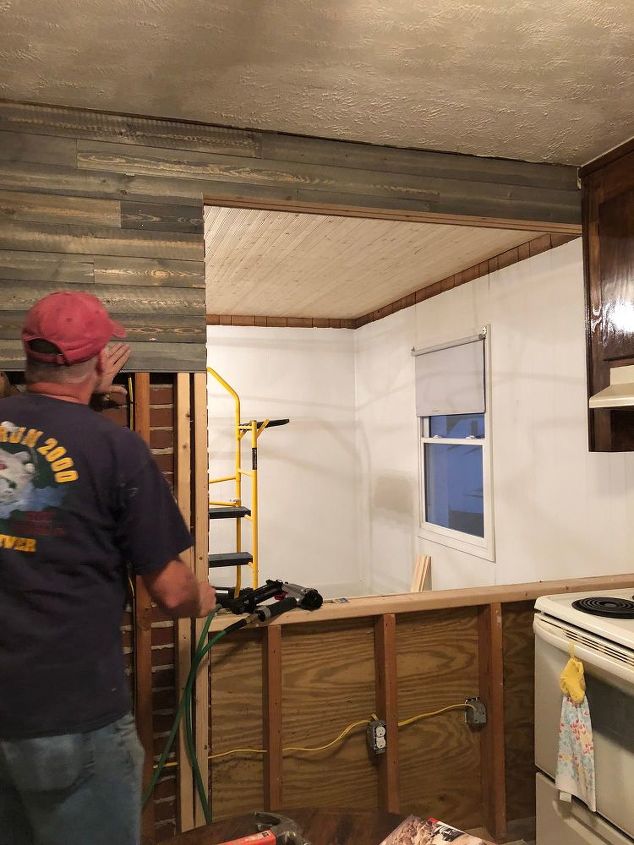 opening up a wall in a tiny closed off kitchen