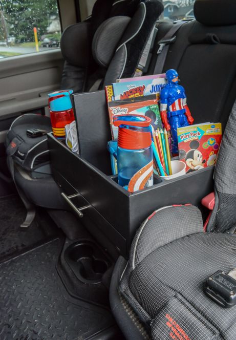 15 Clever Car Organizer DIYs- You don't need to buy any fancy organizers to keep your car neat! Here are 10 clever (and inexpensive) car organization ideas! | car organizer, kids car organization ideas, backseat organizer, seat back organizer, DIY organization, easy organization, vehicle organizer, DIY car trash can, how to organize your car #organizingTips #carOrganization #organize #organization #ACultivatedNest