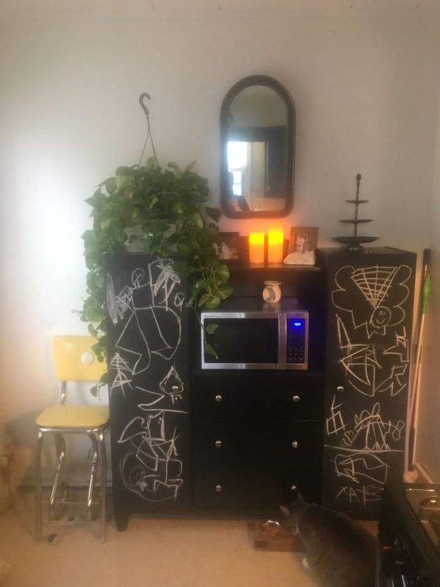 q added greenery to cabinet