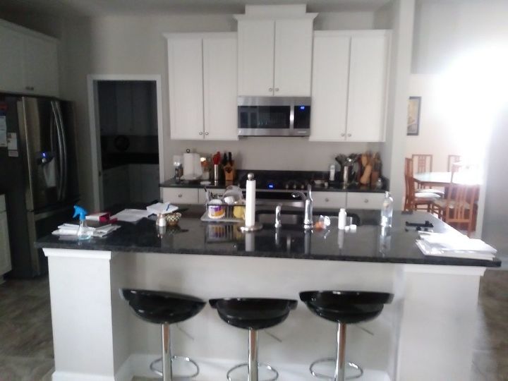 q i need a backsplash in kitchen would like a turchoise glass pros cons