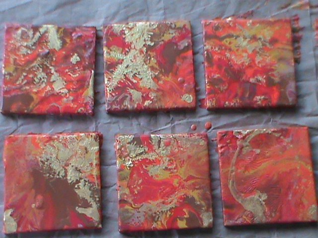 acrylic paint pour with feathered gold enamel wall art