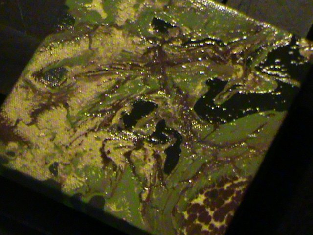 acrylic paint pour with feathered gold enamel wall art