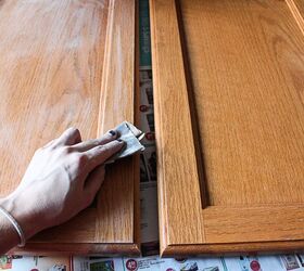 how to add farmhouse cabinet trim, Step 4 Sand down your cabinets