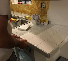 how to add farmhouse cabinet trim, Step 5 Lay tile over counters