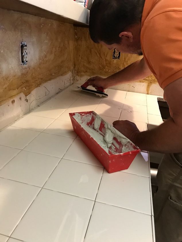 how to add farmhouse cabinet trim, Step 6 Grout tile