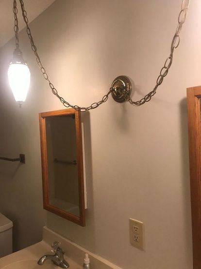 how can i update this 80 s swag bathroom light hometalk