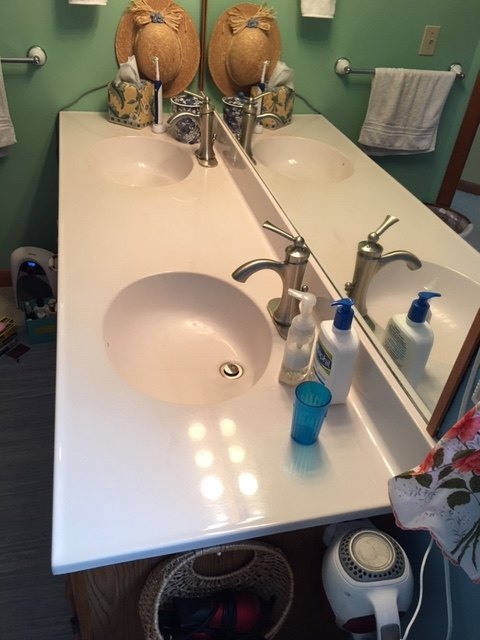 q how do i refurbish an older bathroom double sink in form vanity top