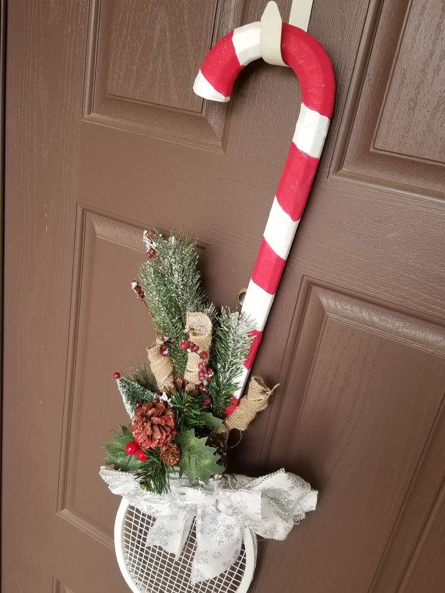 s 19 diy christmas decor ideas that ll rock your holiday, Candy cane wait what