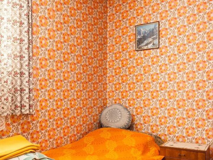 q can i paint over wallpaper