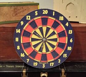 s 23 diy wall clocks you ll love, Repurposed Dart Board Clock