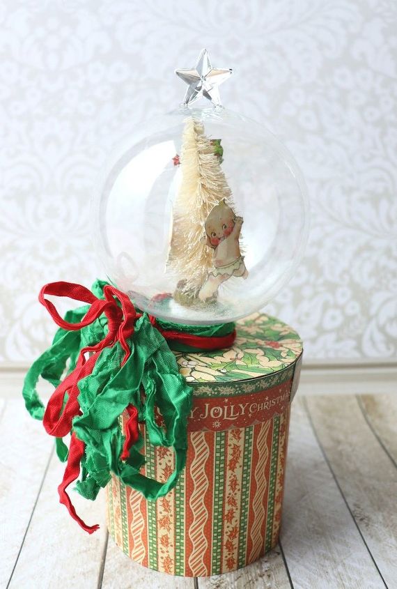 caja de regalo de globo de nieve para las fiestas navideas