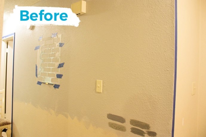 a diy stenciled brick hallway accent wall