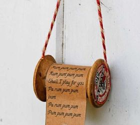wooden spool and christmas song ornament