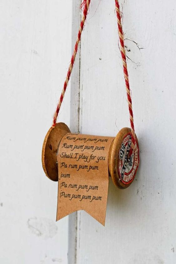 wooden spool and christmas song ornament