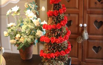  Árvore de Natal de garrafas e arbustos com espiral de rosas