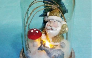  Decoração de natal sob um cloche, uma cena de neve brilhante