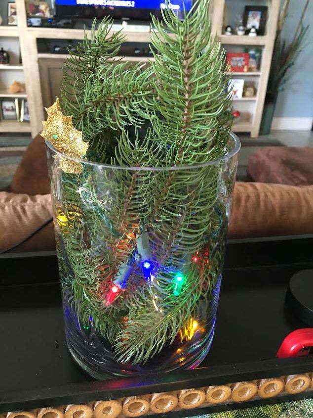 jar balls and lights add a festive holiday feel, Glass container with tiny lights greens